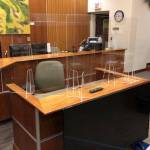 A witness chair is encased in plexiglass as part of social distancing measures taken inside a courtroom at the Kenai Courthouse, pictured in this October 2020 photo. (Photo courtesy Judge Jennifer Wells)