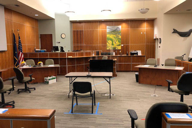 A witness chair stands in the middle of a courtroom at the Kenai Courthouse as part of socially distancing measures, photographed in October 2020. (Photo courtesy Judge Jennifer Wells)