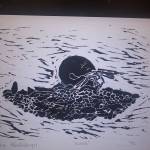 Linoleum prints made by Seward Middle and High School students are seen here in this undated photo. Anyone who brings in a receipt to one of three locations on the peninsula showing they donated $10 or more to the Alaska SeaLife Center in Seward gets to take home a print of their choice. (Photo courtesy Megan Wiley)