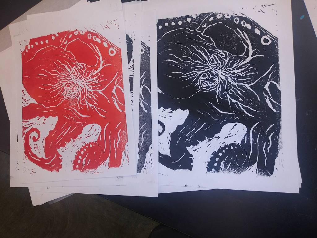 Linoleum prints made by Seward Middle and High School students are seen here in this undated photo. Anyone who brings in a receipt to one of three locations on the peninsula showing they donated $10 or more to the Alaska SeaLife Center in Seward gets to take home a print of their choice. (Photo courtesy Megan Wiley)