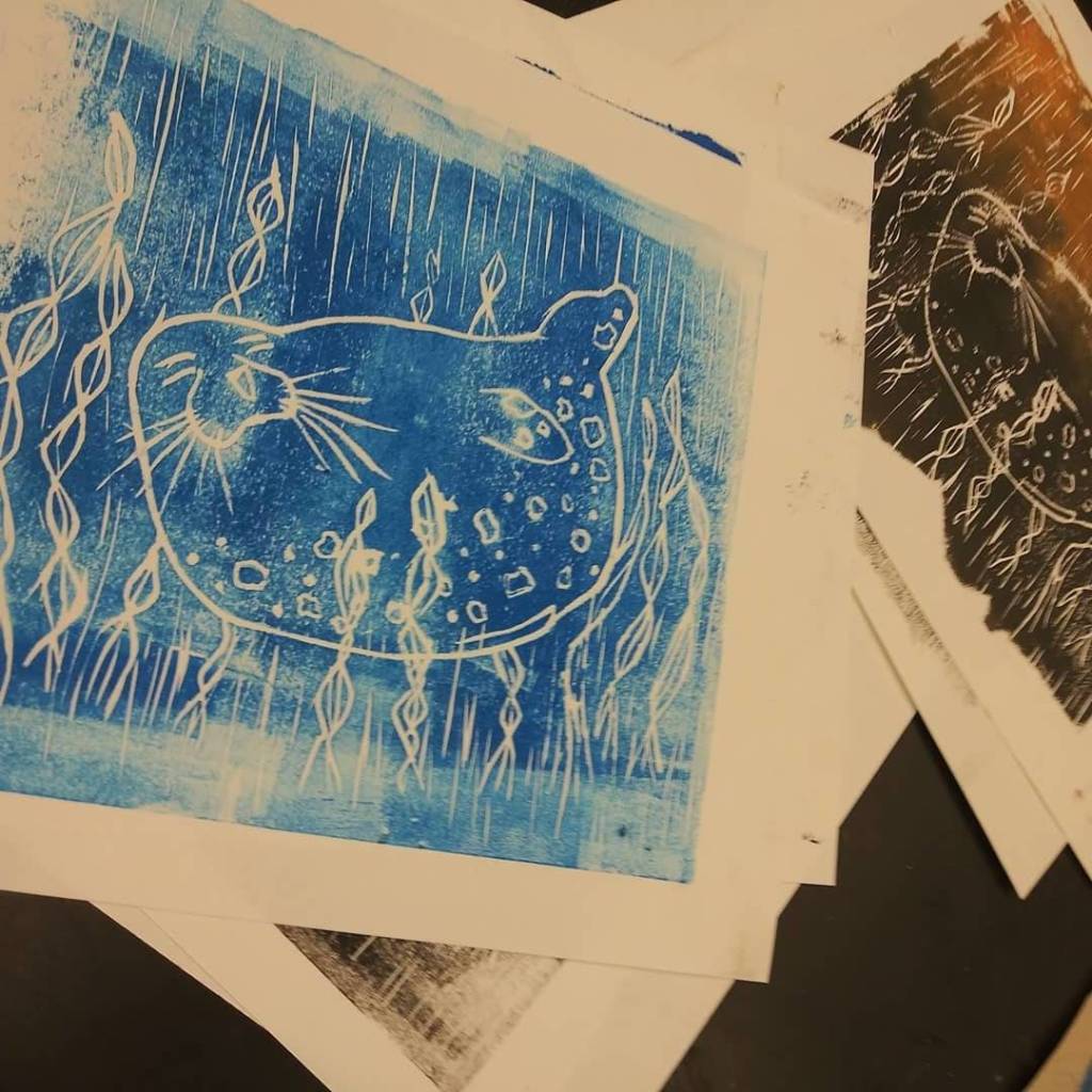 Linoleum prints made by Seward Middle and High School students are seen here in this undated photo. Anyone who brings in a receipt to one of three locations on the peninsula showing they donated $10 or more to the Alaska SeaLife Center in Seward gets to take home a print of their choice. (Photo courtesy Megan Wiley)