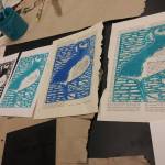 Linoleum prints made by Seward Middle and High School students are seen here in this undated photo. Anyone who brings in a receipt to one of three locations on the peninsula showing they donated $10 or more to the Alaska SeaLife Center in Seward gets to take home a print of their choice. (Photo courtesy Megan Wiley)