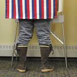 A Homer resident casts their vote during the Primary Election on Tuesday, Aug. 18, 2020 at Homer City Hall in Homer, Alaska. (Photo by Megan Pacer/Homer News)