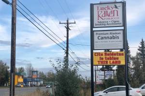 A message opposing annexation is visible on an electronic sign at Lucky Raven Tobacco, located inside one of the proposed areas for annexation, on Thursday, Sept. 5, 2019, near Soldotna, Alaska. (Photo by Victoria Petersen/Peninsula Clarion)