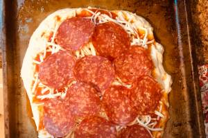 Pepperoni pizza is ready to go into the oven, on Monday, Nov. 2, 2020, in Anchorage, Alaska. (Photo by Victoria Petersen/Peninsula Clarion)