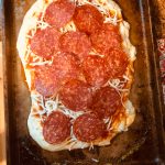 Pepperoni pizza ready to go into the oven, on Monday, Nov. 2, 2020, in Anchorage, Alaska. (Photo by Victoria Petersen/Peninsula Clarion)