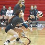 Soldotnas Morgan Bouschor digs up a ball against Kenai Central on Nov. 7, 2020, at Kenai Central High School. (Photo by Jeff Helminiak/Peninsula Clarion)