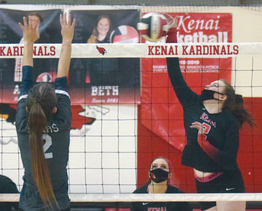 Kenai Centrals Bethany Morris attacks Soldotnas Sierra Kuntz on Saturday, Nov. 7, 2020, at Kenai Central High School in Kenai, Alaska. (Photo by Jeff Helminiak/Peninsula Clarion)