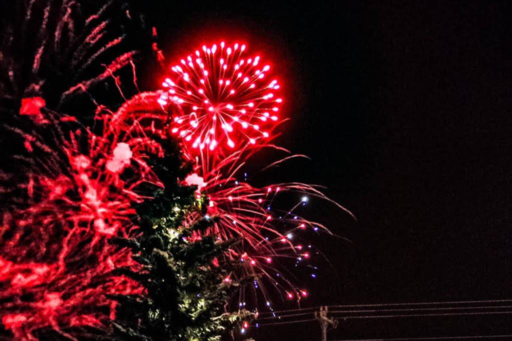 Fireworks can be seen across the Kenai River during the 2020 Christmas Comes to Kenai Parade on Nov. 27, 2020. (Photo courtesy Brittany Brown/Kenai Chamber of Commerce)
