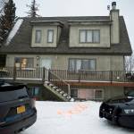 Alaska State Troopers investigate a fatal shooting scene at a home on North Valley Way in Palmer, Alaska, Monday, Nov. 30, 2020. An 18-year-old Alaska man just out of jail for assaulting a family member has been charged with killing four members of his family, including two cousins under the age of 10, charging documents released Tuesday, Dec. 1, 2020 said. (Marc Lester/Anchorage Daily News via AP)