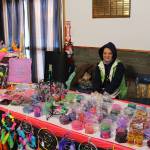 Sara Rodriguez of Kenai displays some of her wares during the inaugural Lady Shriners Craft Far at the Kenai Soldotna Shrine Club in Soldotna, Alaska on Dec. 5, 2020. (Photo by Brian Mazurek/Peninsula Clarion)