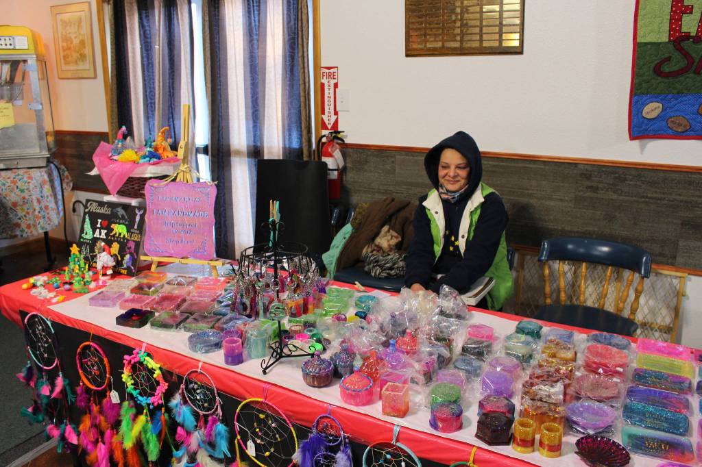 Sara Rodriguez of Kenai displays some of her wares during the inaugural Lady Shriners Craft Far at the Kenai Soldotna Shrine Club in Soldotna, Alaska on Dec. 5, 2020. (Photo by Brian Mazurek/Peninsula Clarion)