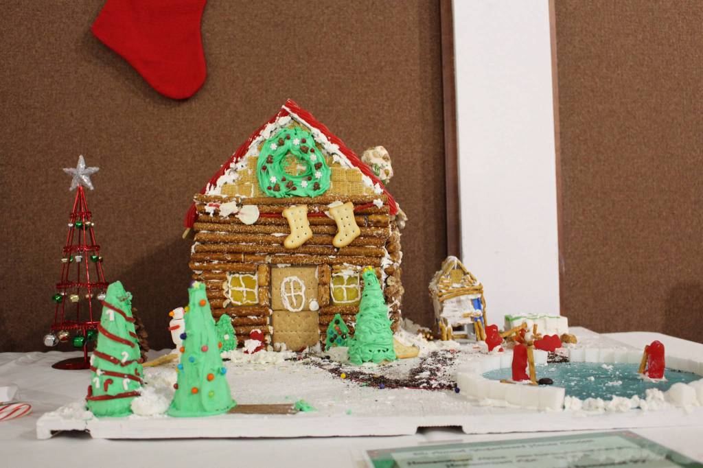 A gingerbread house created by Alissa Boettcher, Ava Lloyd and Elaina Lloyd, ages 13, 11 and 9, is seen on display at the Kenai Visitors and Cultural Center on Dec. 8, 2020. (Photo by Brian Mazurek/Peninsula Clarion)