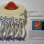 Fried egg jelly with a fish is one of the pieces in Kim Schusters exhibit, Science Observed Through Art: Unsung Species, as seen here on Friday, Dec. 4, 2020, at Ptarmigan Arts in Homer, Alaska. (Photo by Michael Armstrong/Homer News)