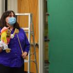 Kenai Community Library Program Coordinator Elizabeth Kleweno holds a puppet at Kenai Community Library on Friday, Dec. 11 in Kenai, Alaska.