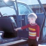 Four-year-old Lowell Fair indicates the backseat of the Fair family stationwagon during a 1972 photo-op set up by his father. (Photo courtesy of the Fair Family Collection)