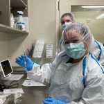 Krischelle Batac and Justin Richardson, pharmacy technicians with Bartlett Regional Hospital, prepares the first dose of the Pfizer/BioNTech coronavirus vaccine on Dec. 15, 2020. (Courtesy photo / Katie Bausler)