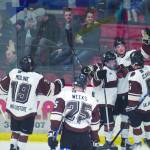Jeff Helminiak / Peninsula Clarion
Kenai River Brown Bears forward Brandon Lajoie (arm raised) celebrates his first-period goal on Jan. 17 against the Maine Nordiques at the Soldotna Regional Sports Complex.