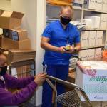Photo courtesy of Alaska VA Healthcare System
Vallerie Card-King, L.CPht, and Bjorn Miller, Pharm D, document and verify the batch numbers of the Moderna Vaccine at the Alaska VA Healthcare System.