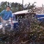 A few days after surviving an Aug. 2, 1967, crash in this single-engine Maule Rocket, Dane Parks poses near the front end of the wreckage. (Photo courtesy