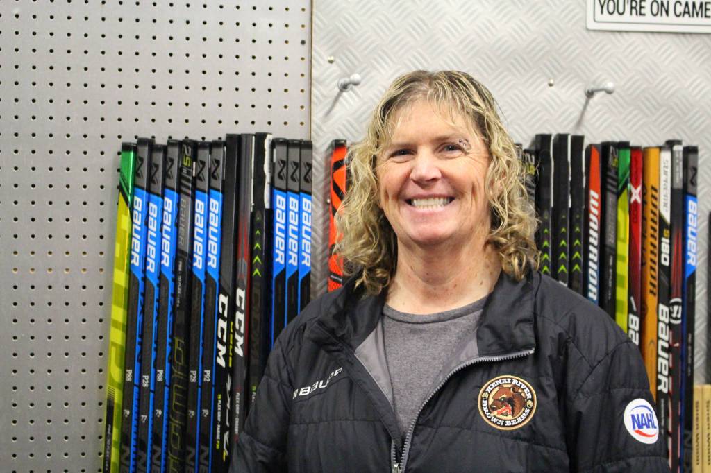 Brian Mazurek/Peninsula Clarion 
Heidi Hanson, owner of the AK SK8 Shop in Soldotna, poses at her store on Saturday.