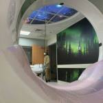 A wall mural of the northern lights and distraction lighting of a night sky are all part of the CT scanner suite renovation at South Peninsula Hospital, as seen here on Monday, Jan. 4, 2021, at South Peninsula Hospital in Homer, Alaska. The new scanner was moved into its new location on Monday. The mural and lighting are designed to contribute to a better patient experience. (Photo by Brent Lautenschlager / South Peninsula Hospital)