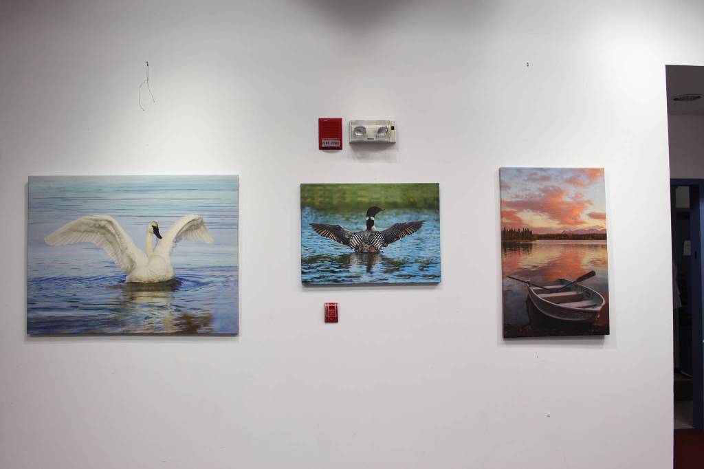 Photographs on canvas by Mary Frische and Tom Collopy are on display at the Kenai Visitor and Cultural Center on Jan. 12, 2021. (Photo by Brian Mazurek/Peninsula Clarion)