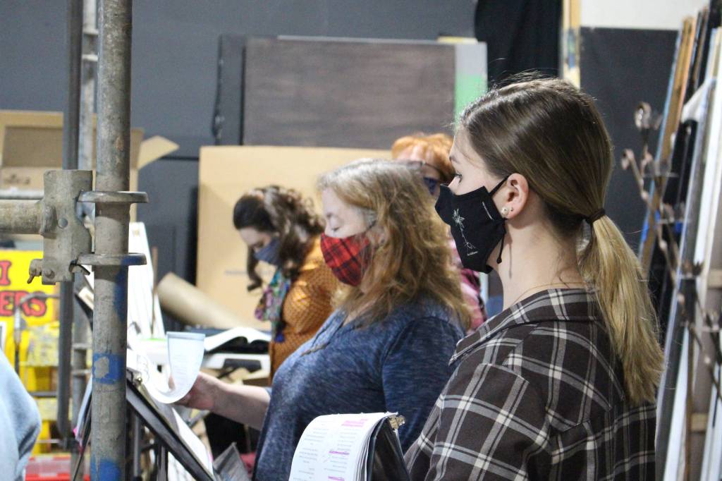 Members of the Kenai Performers rehearse a scene from Murder in the Cathedral at the Kenai Performers black box theater in Soldotna, Alaska, on Jan. 16, 2021. From left: Selia Butler, Jodene McAuliffe, Terri Burdick and Alyeska Krull. (Photo by Brian Mazurek/Peninsula Clarion)