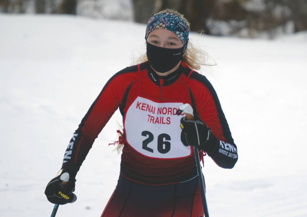 Kenai Centrals Emily Moss takes the victory in the girls race at the Kenai Nordic Trails on Saturday, Jan. 16, 2021, at Kenai Golf Course. (Photo by Jeff Helminiak)
