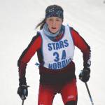 Kenais Jayna Boonstra takes first place in the girls race at the Soldotna Invitational on Saturday, Jan. 23, 2021, at Tsalteshi Trails just outside of Soldotna, Alaska. (Photo by Jeff Helminiak/Peninsula Clarion)