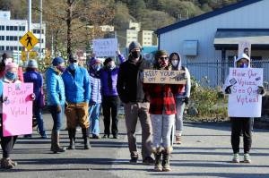 Protesters march for womens rights in Juneau in 2020. Sen. Lisa Murkowski, R-Alaska, announced a bipartisan bill Friday, Jan. 22, 2021 to move forward the ratification of the Equal Rights Amendment, granting equal legal protection to the sexes, stalled in its ratification stage since 1972. (Ben Hohenstatt / Juneau Empire File)