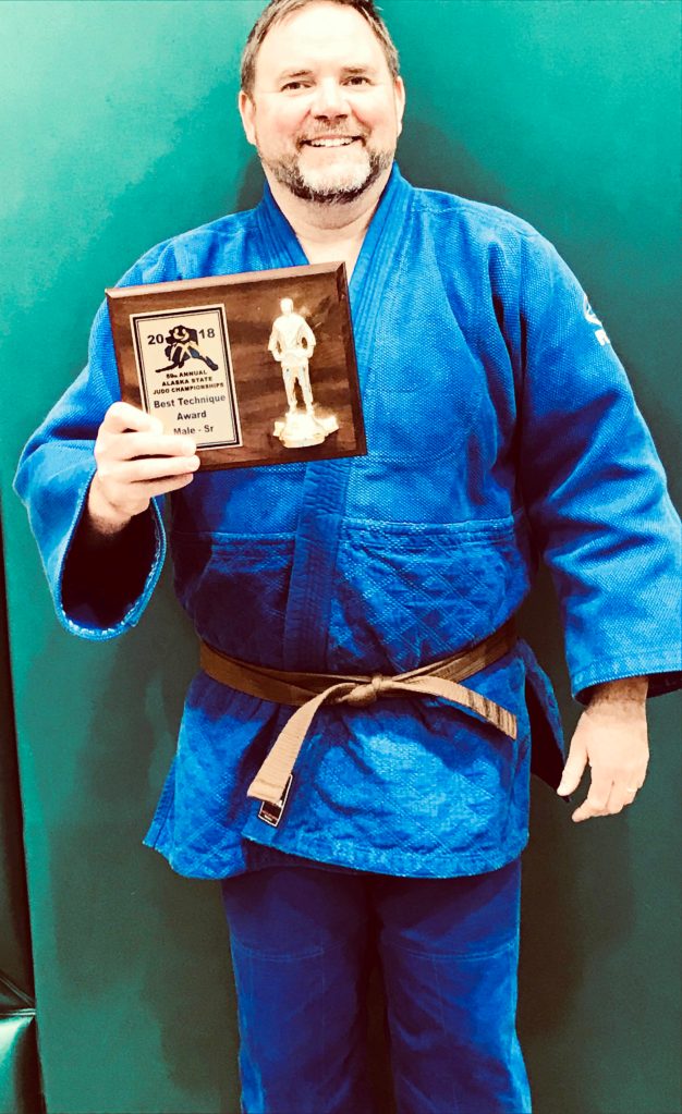 New Kenai Peninsula Borough School District Superintendent Clayton Holland after winning the Alaska State Championships, defeating a 4th degree blackbelt two times out of three in May 2018. He received his blackbelt the same day. (Photo provided by Robert Brink)