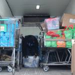 Roy Phillips unloads food and supplies for Project Homeless Connect at the Sterling Senior Citizens Center in Sterling, Alaska, on Feb. 2, 2021. (Photo by Brian Mazurek/Peninsula Clarion)