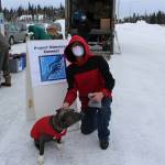 Dale Curtis poses for a photo with his dog, Jackson, during a Project Homeless Connect event at the Sterling Senior Citizens Center in Sterling, Alaska, on Feb. 2, 2021. (Photo by Brian Mazurek/Peninsula Clarion)