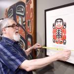 Michael Penn / Juneau Empire File
Paul Gardinier, an exhibit specialist, works to install a Nathan Jackson retrospective in the gallery at the Walter Soboleff Center on March 25, 2019.