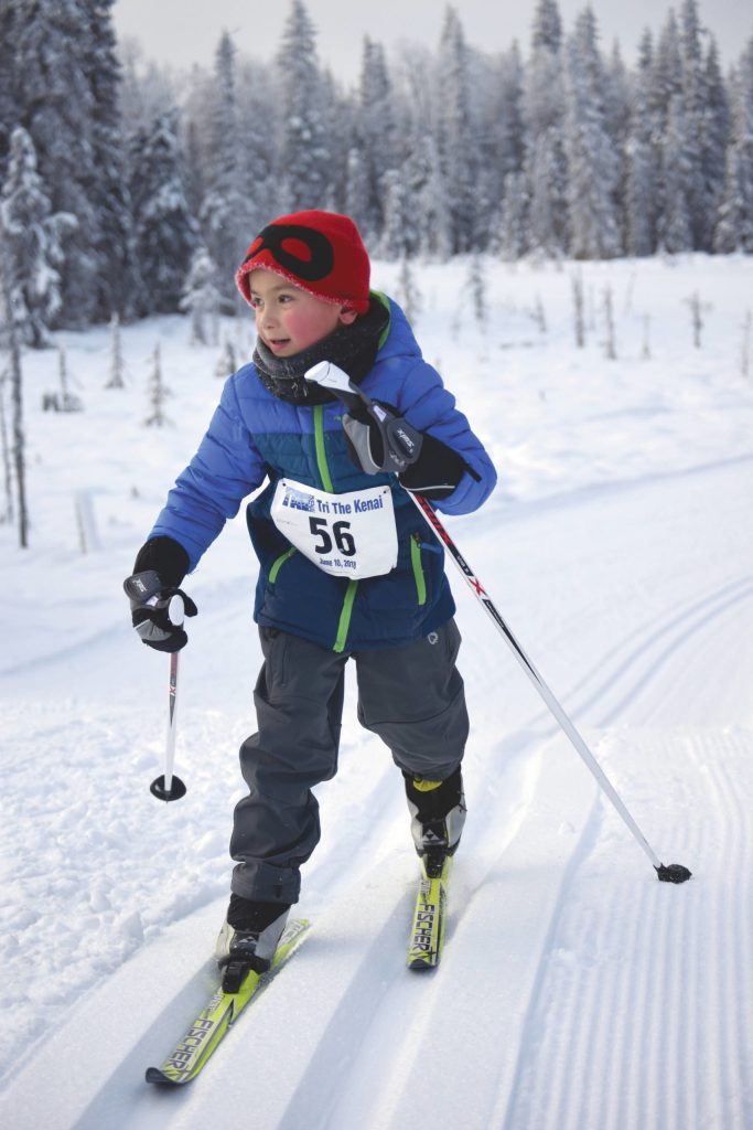 Alaska Hippchen crests a hill at the 17th Ski for Women on Sunday, Feb. 7, 2021, at Tsalteshi Trails just outside of Soldotna, Alaska. (Photo by Jeff Helminiak/Peninsula Clarion)