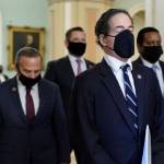 Democratic House impeachment managers from left, Rep. David Cicilline, D-R.I., Rep. Eric Swalwell, D-Calif., Rep. Jamie Raskin, D-Md., and Rep. Joe Neguse, D-Colo.,walk out of the Senate Chamber in the Capitol at the end of the fifth day of the second impeachment trial of former President Donald Trump, Saturday, Feb. 13, 2021, in Washington. The Senate has acquitted Donald Trump of inciting the Jan. 6 attack on the U.S. Capitol, bringing his trial to a close and giving the former president a historic second victory in the court of impeachment. (AP Photo/J. Scott Applewhite)