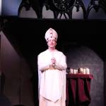 Mark Burton portrays Thomas Becket at a rehearsal of Murder in the Cathedral on Monday, Feb. 15 in Soldotna, Alaska. (Ashlyn OHara/Peninsula Clarion)