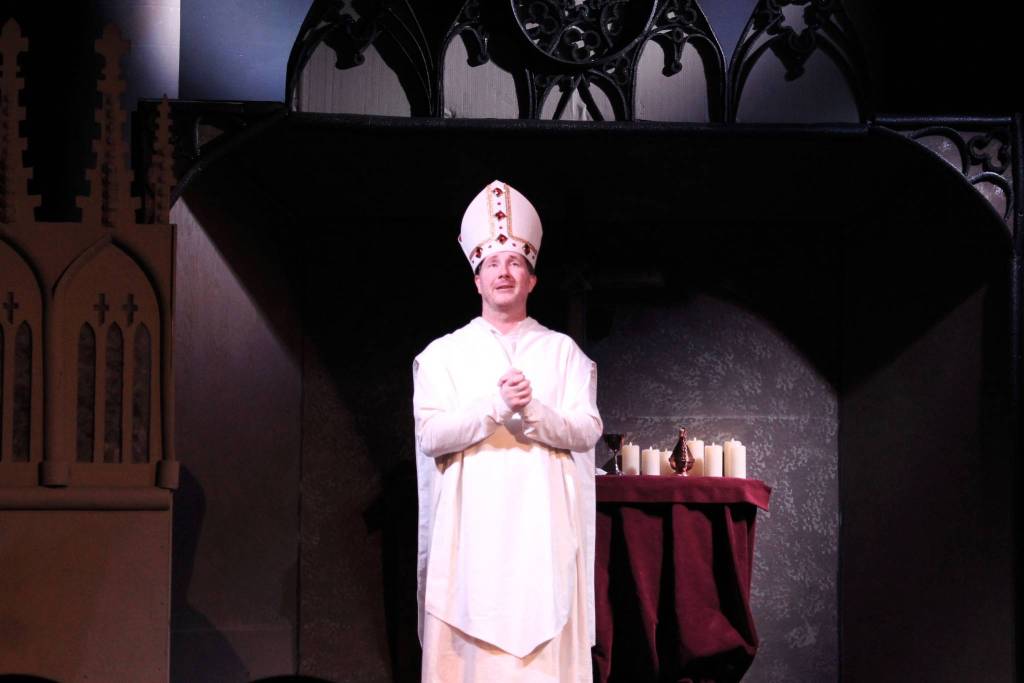 Mark Burton portrays Thomas Becket at a rehearsal of Murder in the Cathedral on Monday, Feb. 15 in Soldotna, Alaska. (Ashlyn OHara/Peninsula Clarion)