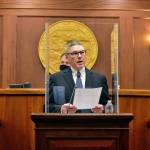 Peter Segall / Juneau Empire
Chief Justice of the Alaska Supreme Court Joel Bolger speaks from behind a plexiglass encased lectern Wednesday to deliver the State of the Judiciary address to state lawmakers. Despite complications posed by the pandemic, Bolger said Alaskan courts were still able to deliver services.
