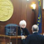 Becky Bohrer / Associated Press
Alaska House Speaker Louise Stutes speaks to Rep. Bryce Edgmon on the House floor on Thursday, in Juneau. The House, which has struggled to organize, on Thursday adopted a report setting out committee assignments, a month into the legislative session.