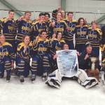 The Homer hockey team celebrates the Division II state championship Saturday, Feb. 20, 2021, at the Curtis Mendard Sports Complex in Wasilla, Alaska. (Photo by Tim Rockey/Frontiersman)