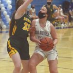 Soldotnas Josie Sheridan drives to the basket against Sewards Robin Cronin on Tuesday, Feb. 23, 2021, at Soldotna High School in Soldotna, Alaska. (Photo by Jeff Helminiak/Peninsula Clarion)