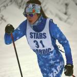 Soldotna's Erika Arthur skis to victory Saturday, Feb. 20, 2021, at the second day of Kenai Peninsula Borough ski meet at Tsalteshi Trails just outside of Soldotna, Alaska. (Photo by Jeff Helminiak/Peninsula Clarion)