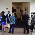 Women members of the Alaska House of Representatives from both parties meet in the hallway of the capitol Wednesday, March 3, 2021, to discuss a vote to condemn Rep. Zack Fields, D-Anchorage, for sexists comments he made on the floor the previous week. (Peter Segall / Juneau Empire)