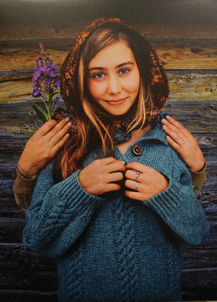 Linda Smogors portrait, Oshi with Thorey, is one of the works included in Familiar Faces: Portrait of a Community, on exhibit through May 2021 at the Pratt Museum in Homer, Alaska. (Photo by Michael Armstrong/Homer News)