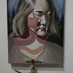 Melissa Shaginoffs Kaggkaggos tsen zuul (Swan Wing Bone / Drinking Tube) is a portrait of her youngest sister that includes a swan wing bone necklace with an insulin bottle and beaded syringe. Ahtna young women were given necklaces at the time of their first menstruation. Of her work, Shaginoff writes: At puberty I was diagnosed with type-one diabetes, and autoimmune disease that like colonization attacks the body with reasons unknown and foreign. In place of a puberty necklace I was given a syringe and insulin bottles, tools of a colonized environment. But I see my experience as a story of decolonization. (Photo by Michael Armstrong/Homer News)