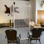 A partition is set up inside Heritage Place Skilled Nursing facility. Partitions have been used to separate residents from visitors due to COVID-19 protocols. (Photo courtesy Sandi Crawford)