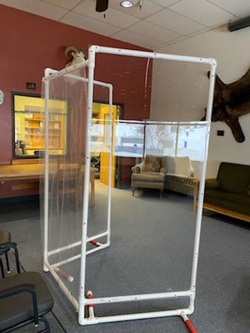 A partition is set up inside Heritage Place Skilled Nursing facility. Partitions have been used to separate residents from visitors due to COVID-19 protocols. (Photo courtesy Sandi Crawford)