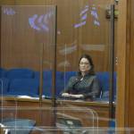 Alaska state Sen. Lora Reinbold sits in a Senate gallery on Friday, in Juneau. The Alaska Senate voted Wednesday to allow leadership to restrict access to the Capitol by Reinbold, an Eagle River Republican, over violations of protocols meant to guard against COVID-19. (AP Photo/Becky Bohrer, Pool)